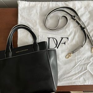 Diane Von Furstenberg black w/ white accent small CrossBody trapeze handbag